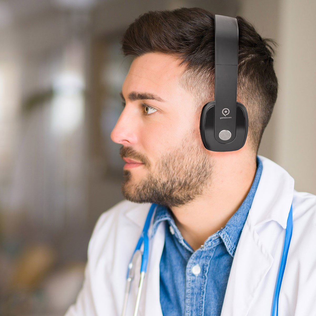 Doctor with wireless stereo headphones